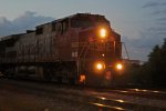 A slow shutter speed and some panning is required to capture BNSF 660 leading #8 out of town